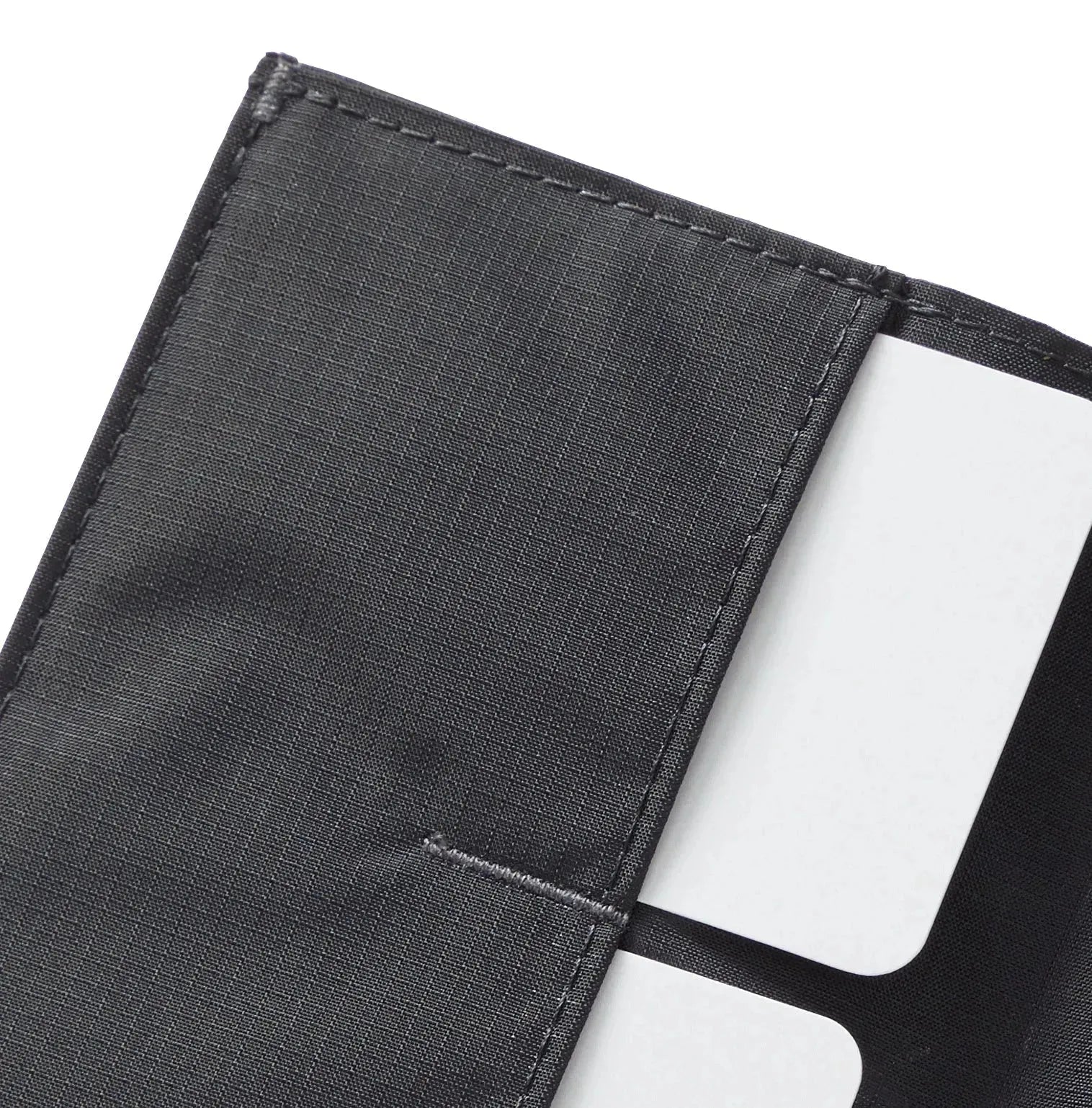 close-up of corner of the Allett Wallet original nylon wallet in jet-black