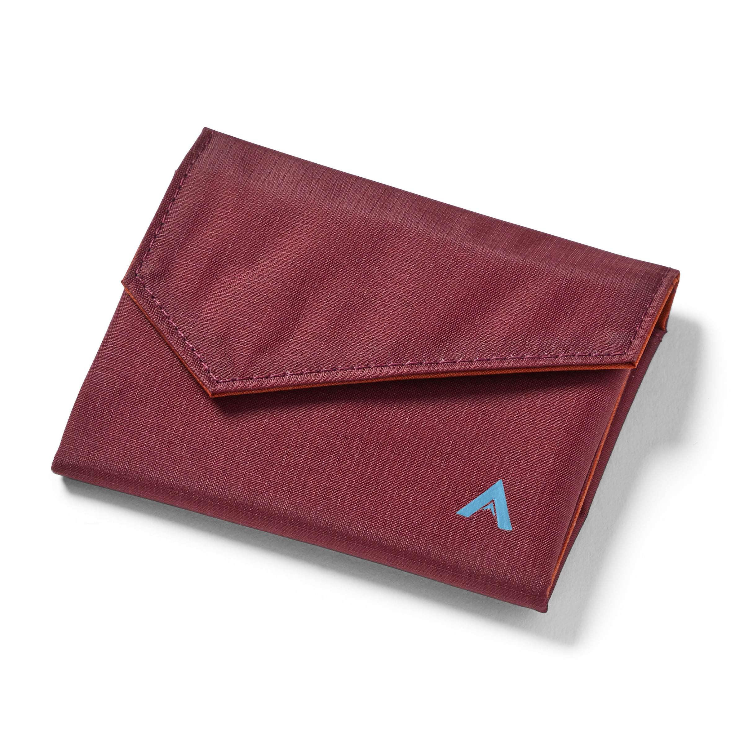 Closed merlot vegan nylon accordion wallet against a white background, the Allett logo visible on the bottom right, and an angled, slightly triangular flat in the front. Allett Accordion Wallet in RFID Blocking Nylon mulberry