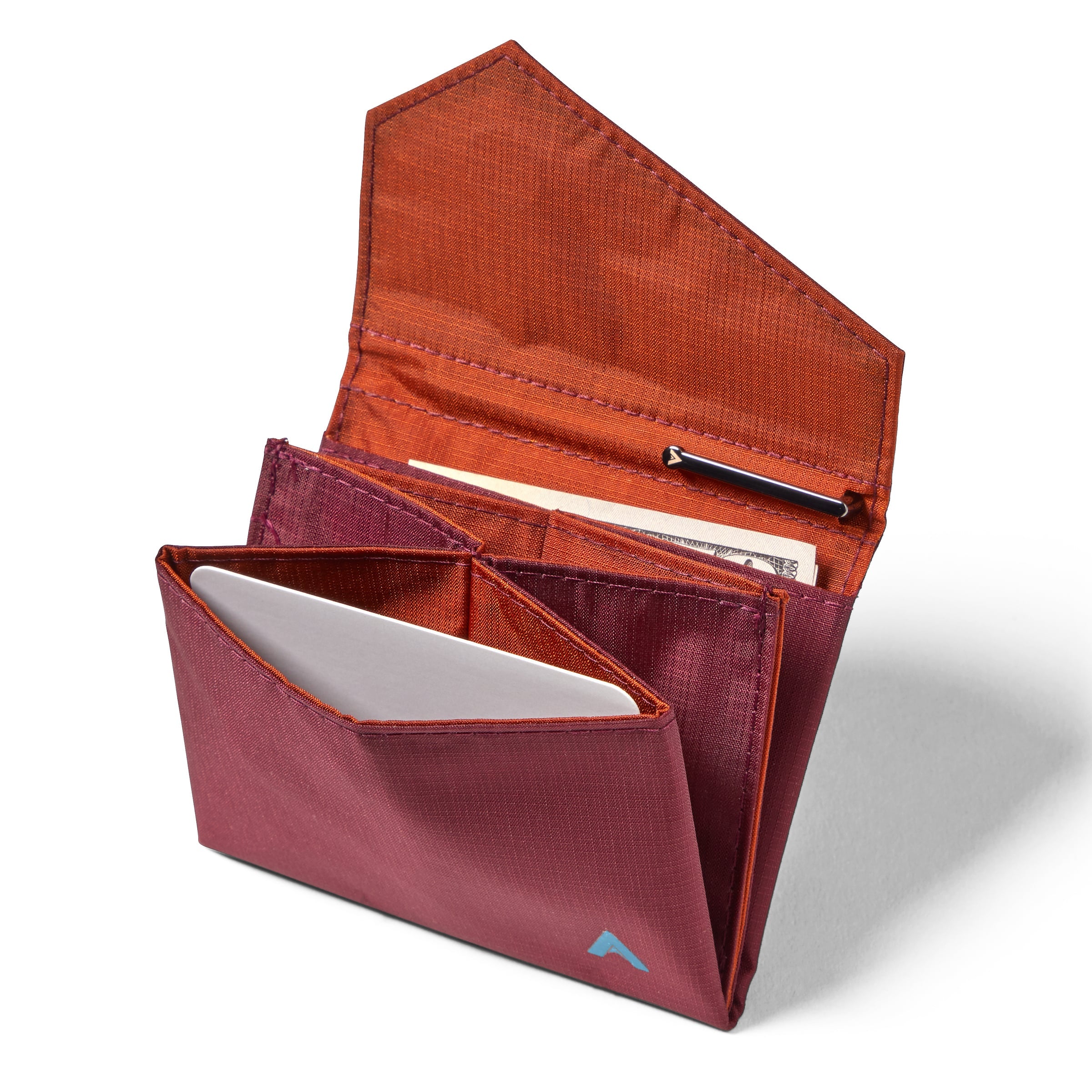 Allett's merlot vegan nylon accordion wallet with the flap lifted to reveal multiple pockets for credit cards and cash, along with a space visible on the inside flap interior. Allett Accordion Wallet in RFID Blocking Nylon mulberry